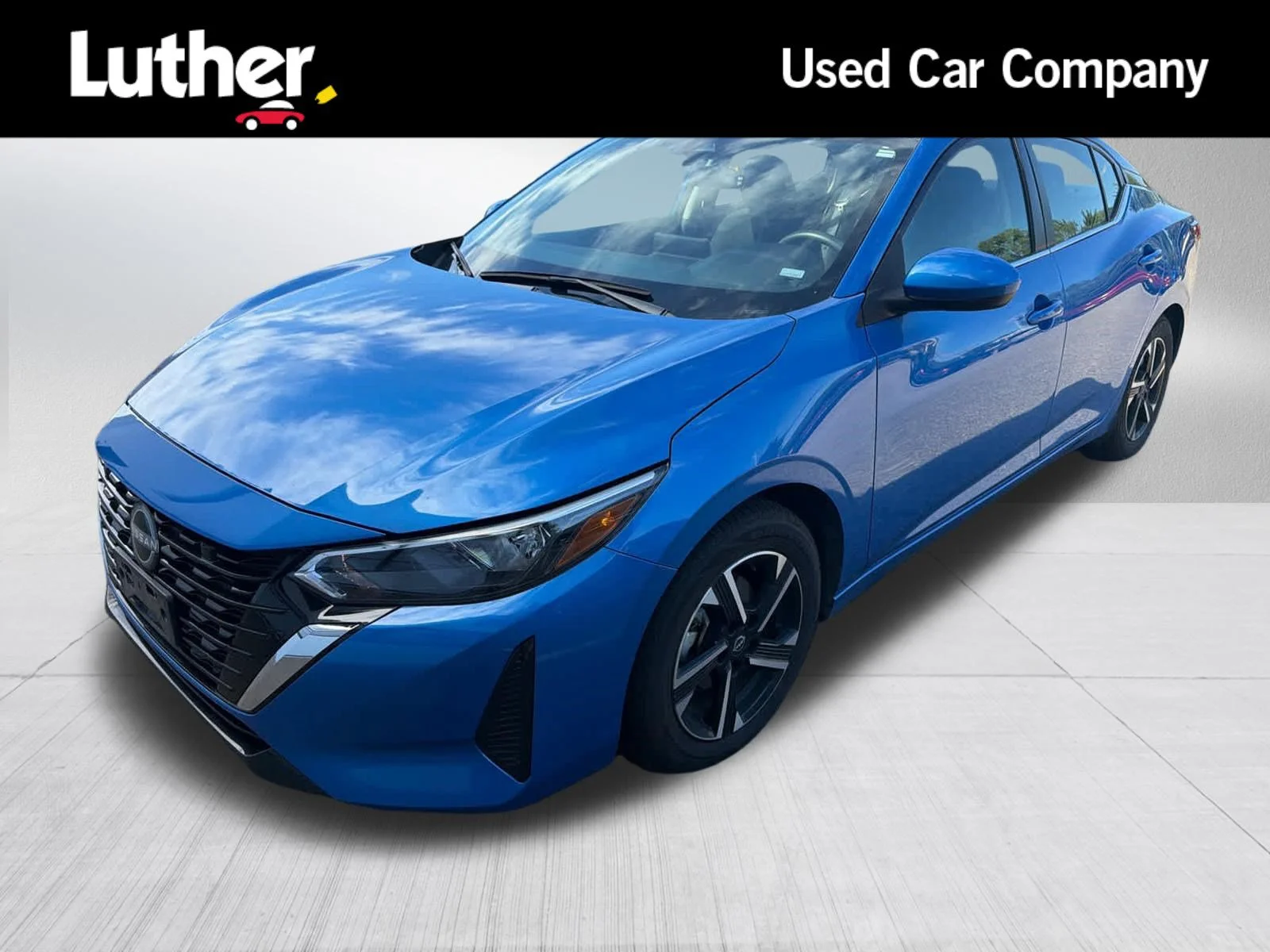 Used 2025 Electric Blue Metallic Nissan SV image 1