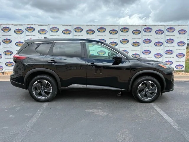 Used 2024 Super Black Nissan SV image 1
