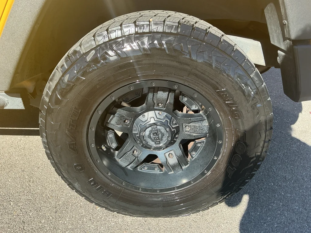 Used 2015 Baja Yellow Jeep Sport image 9