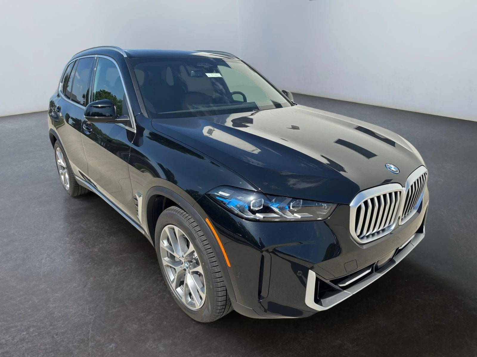 New 2026 Black Sapphire Metallic BMW xDrive50e image 11