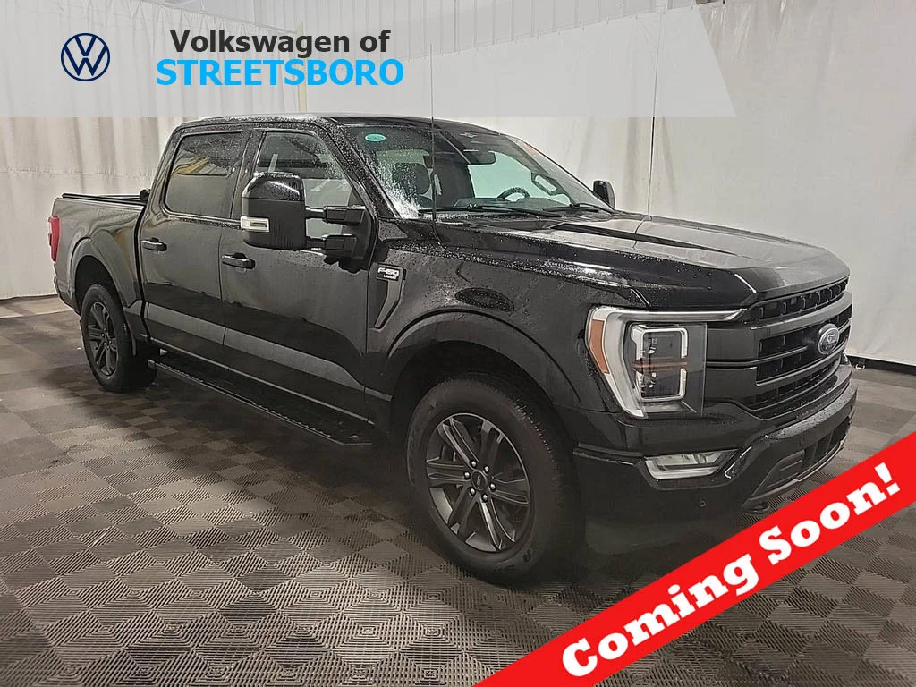 Used 2023 Agate Black Metallic Ford Lariat image 1