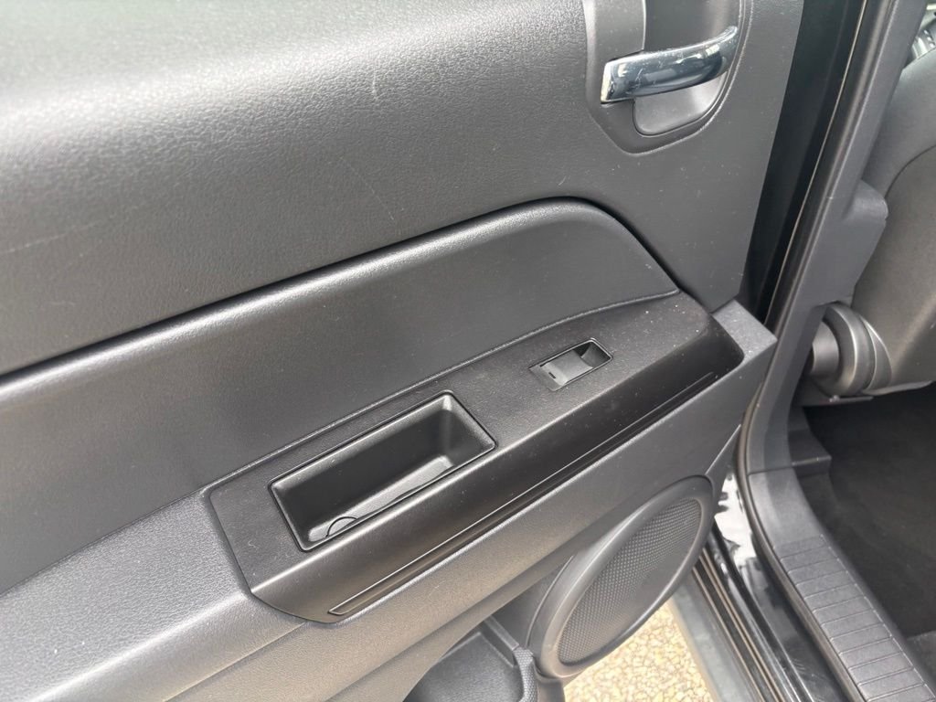 Used 2010 Black Jeep Sport image 9