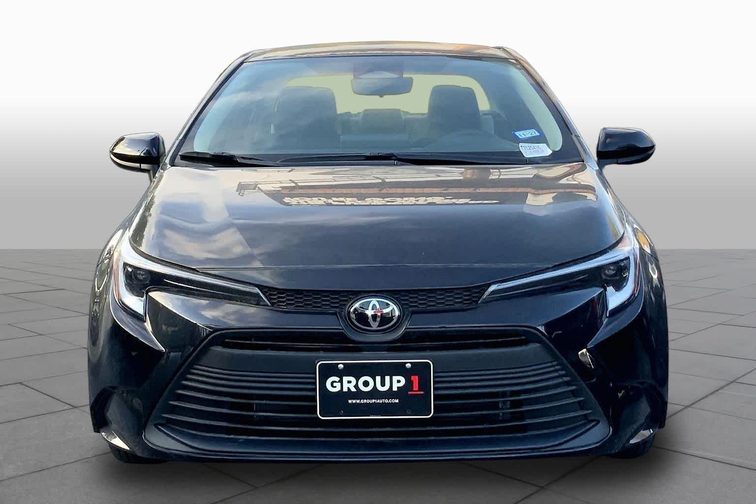 Used 2026 Midnight Black Metallic Toyota Hybrid LE image 4