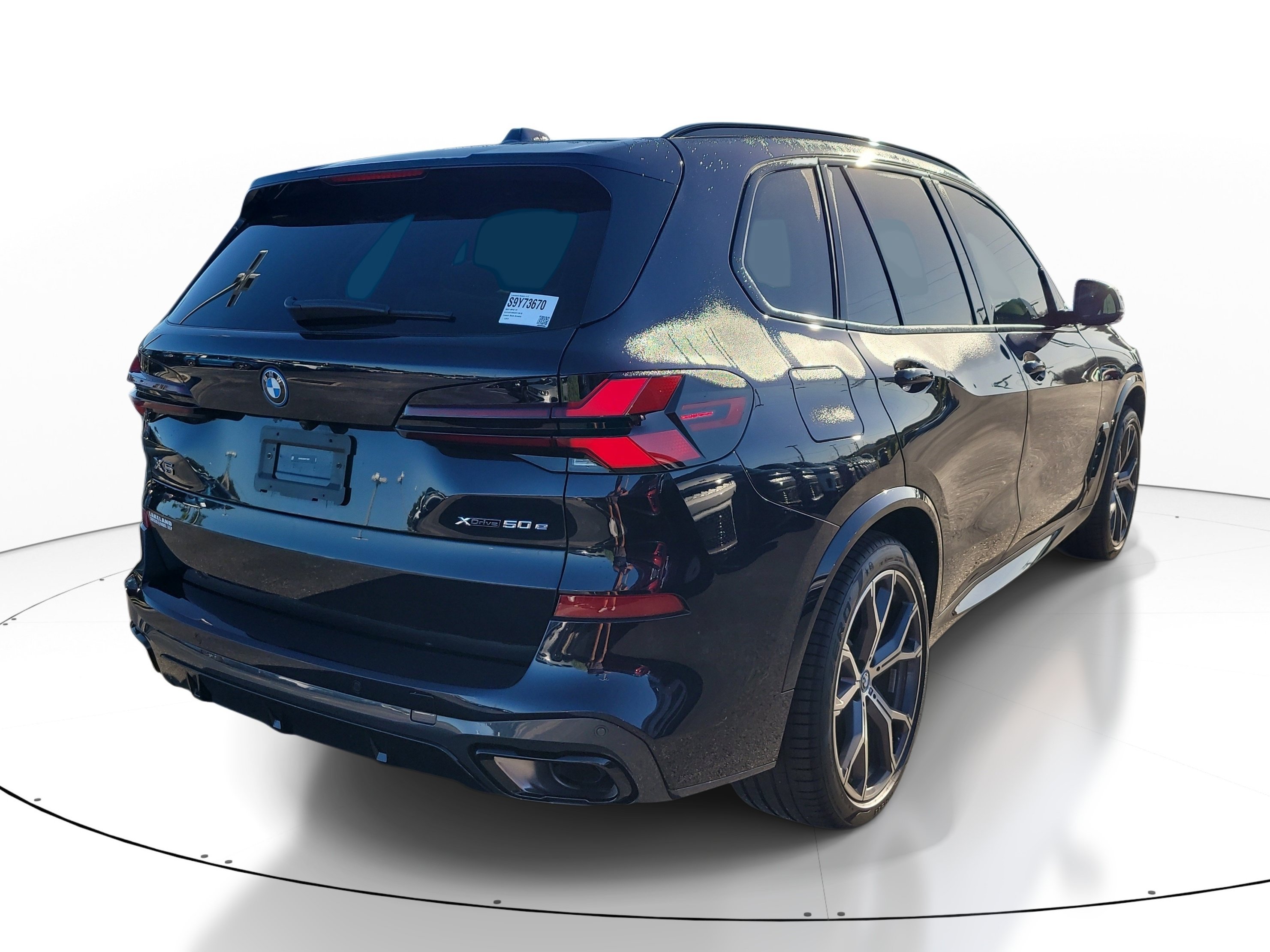 Used 2025 Carbon Black Metallic BMW xDrive50e image 4