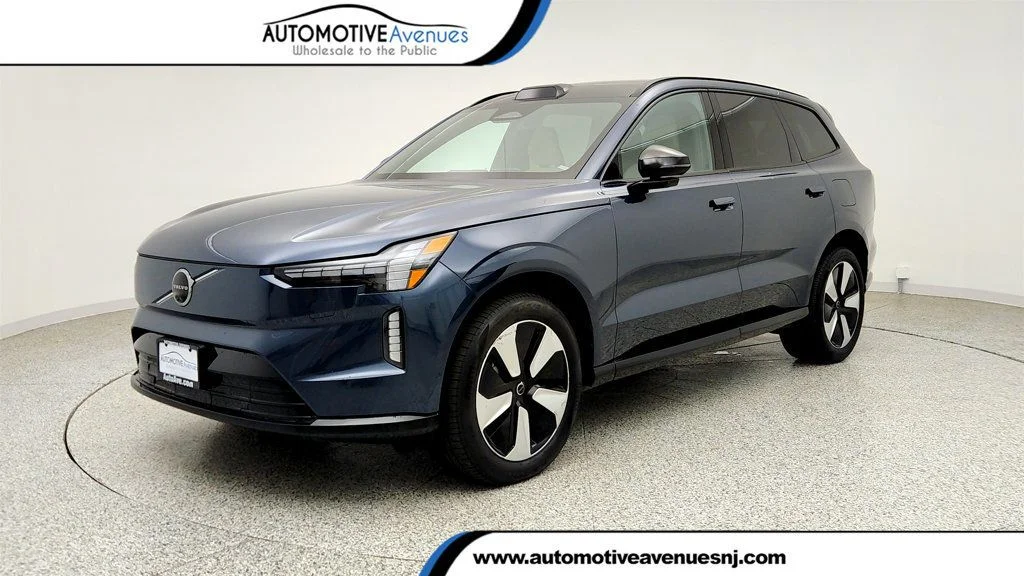 Used 2025 Denim Blue Metallic Volvo Twin Motor Plus 6-Seater w/ Tow Hitch & Panoramic Sunshade image 1