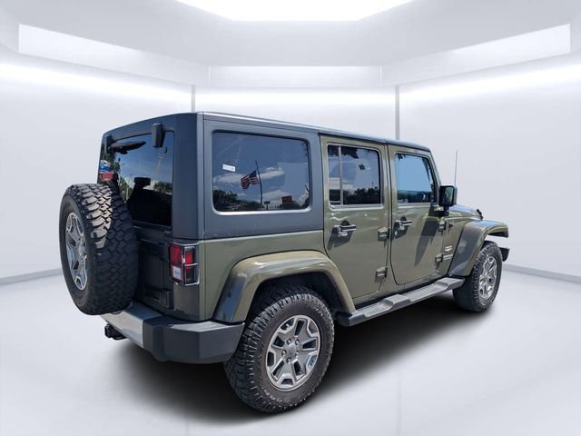 Used 2015 Green Jeep Unlimited Sahara image 3