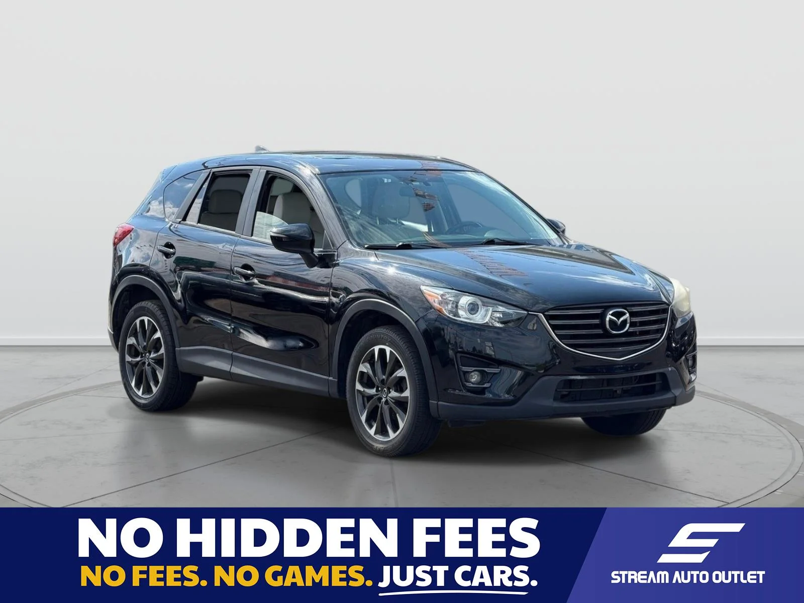 Used 2016 Black Mazda Grand Touring image 1