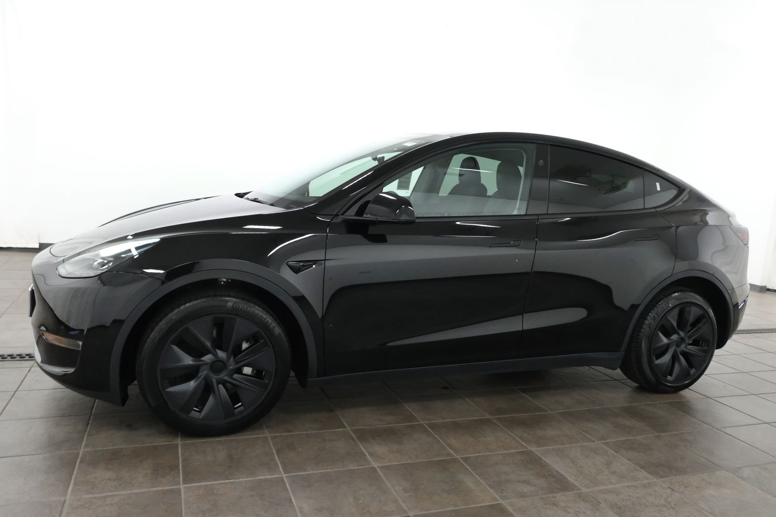 Used 2024 Solid Black Tesla Long Range image 2