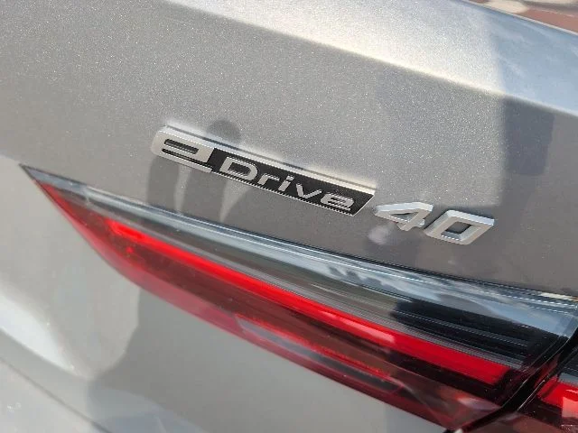 Used 2023 Skyscraper Gray Metallic BMW eDrive40 image 6