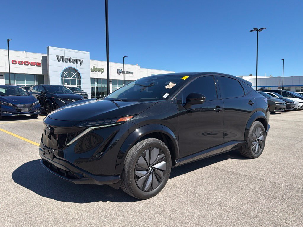 Used 2024 Black Nissan ENGAGE e-4ORCE image 1