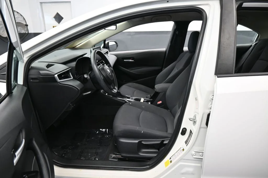 Used 2021 Super White Toyota LE image 10