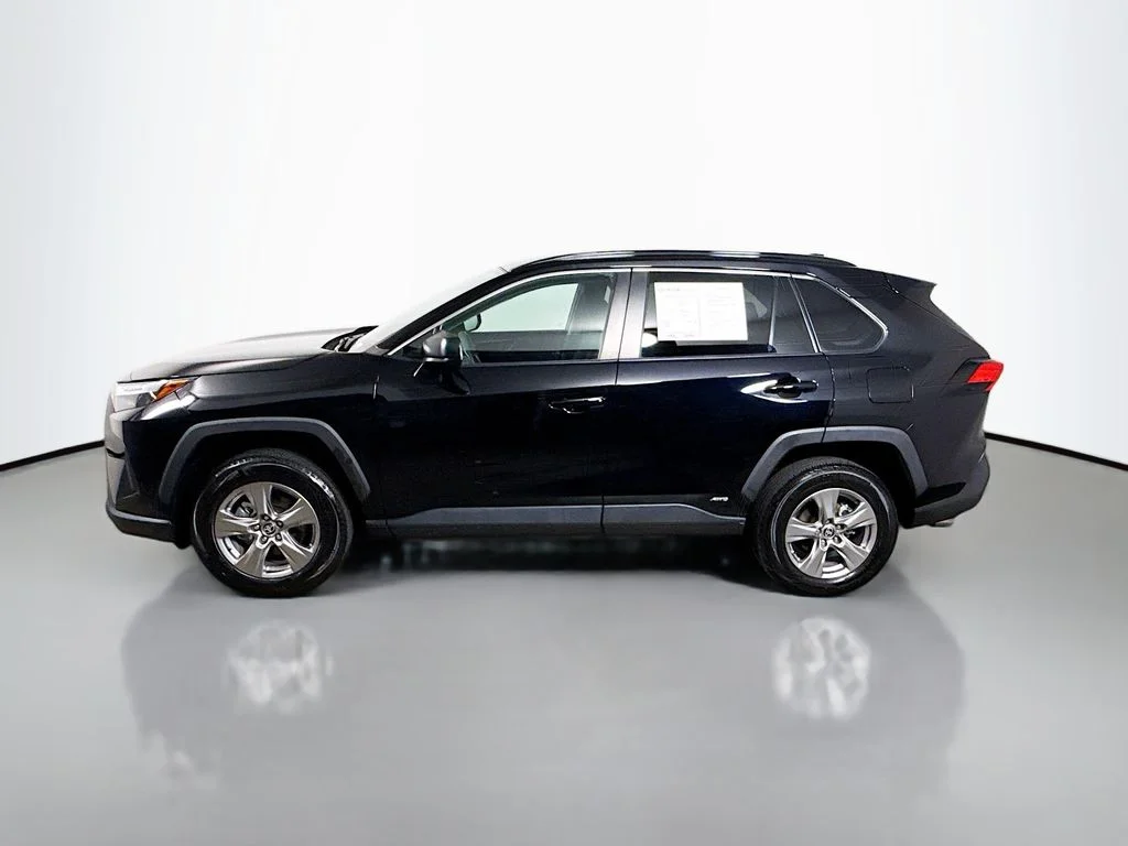 Used 2024 Midnight Black Metallic Toyota Hybrid LE image 4