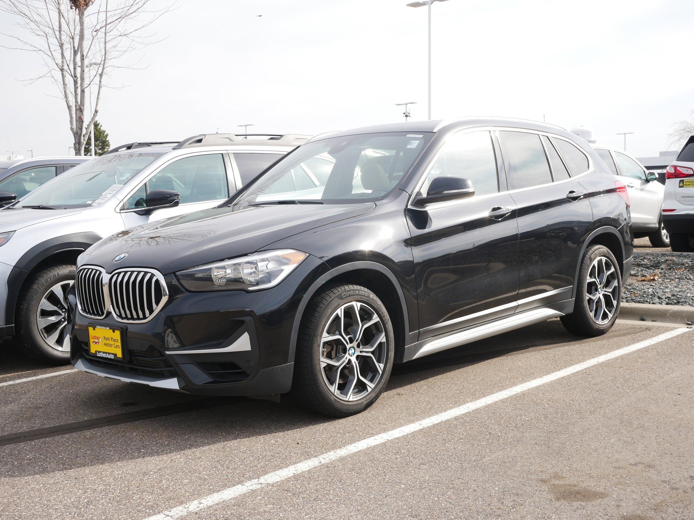 Used 2021 BMW X1 28i with VIN WBXJG9C04M5T61761 for sale in Brooklyn Center, Minnesota
