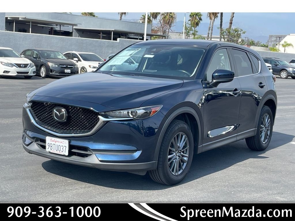 Used 2019 Deep Crystal Blue Mica Mazda Touring image 1