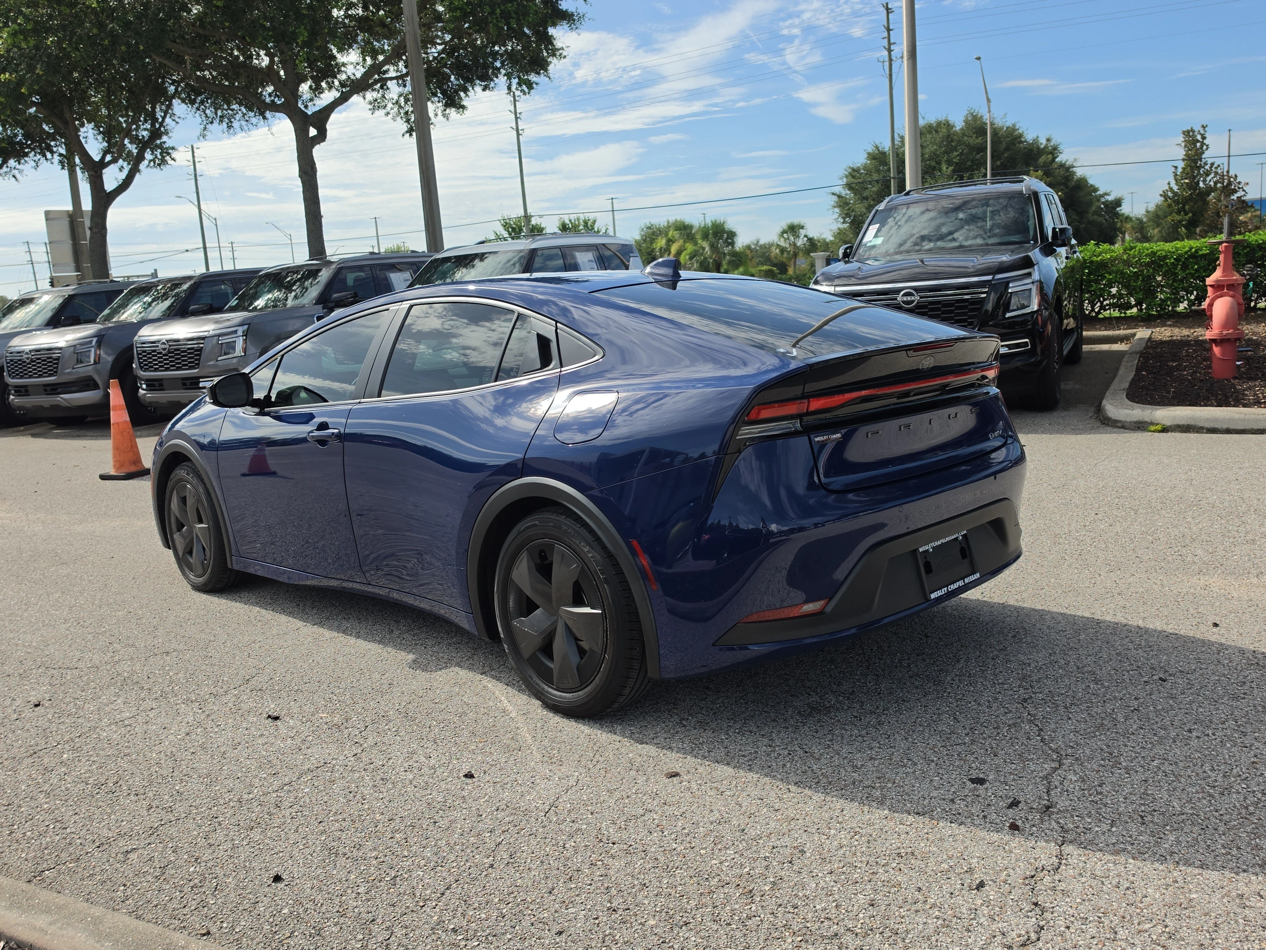 Used 2024 Reservoir Blue Toyota LE image 6