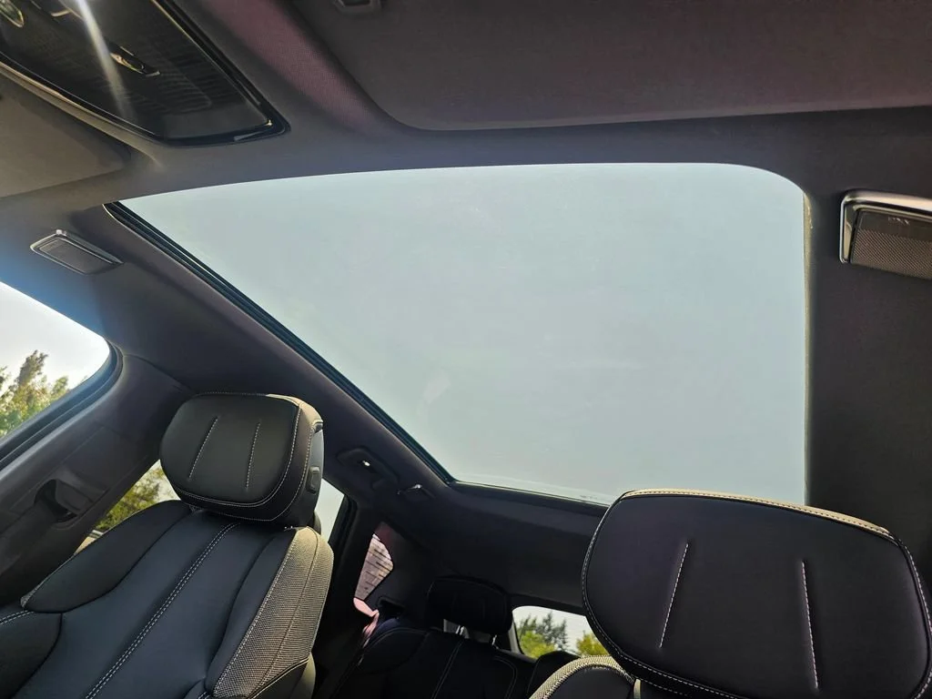 New 2026 Vibrant White Tricoat Cadillac Sport image 21