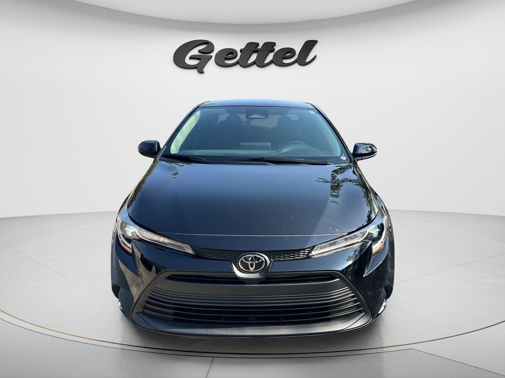 Used 2024 Black Toyota LE image 2