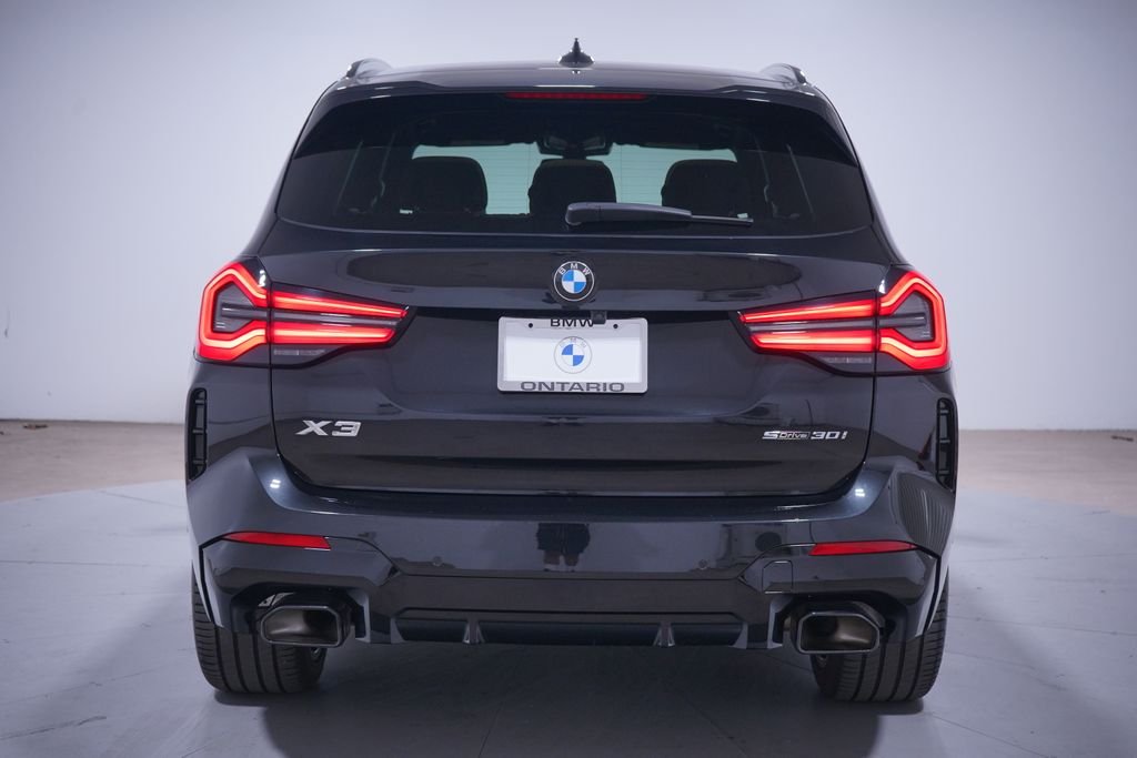 Certified Used 2024 Black Sapphire Metallic BMW sDrive30i image 6