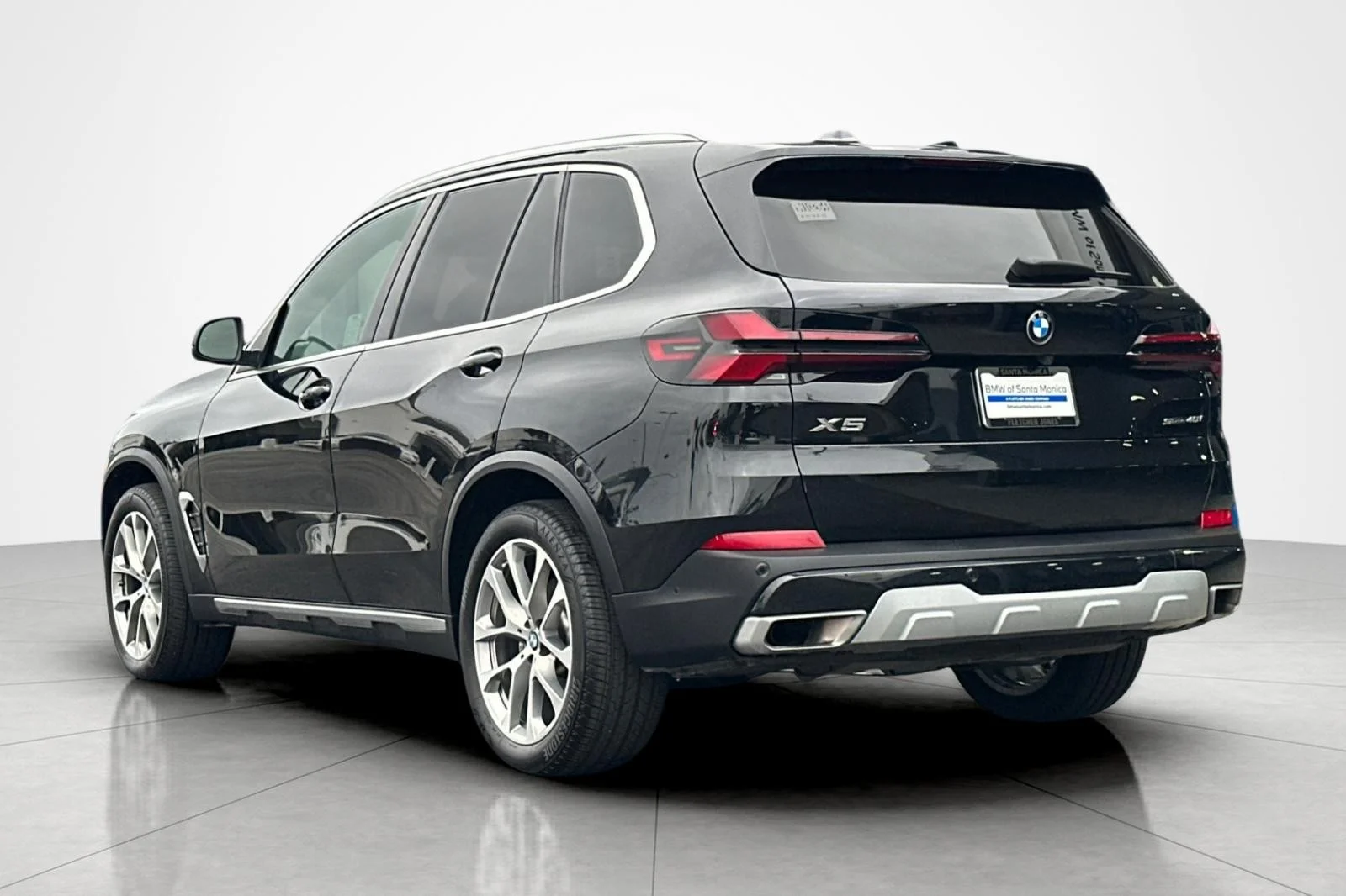 Used 2025 Black Sapphire Metallic BMW sDrive40i image 3