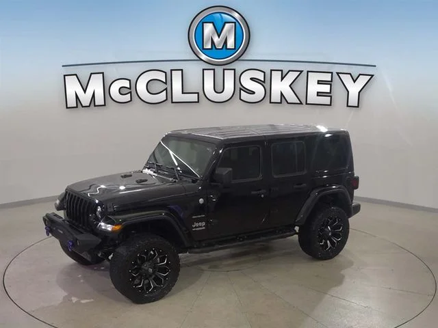 Used 2018 Black Jeep Unlimited Sahara image 1