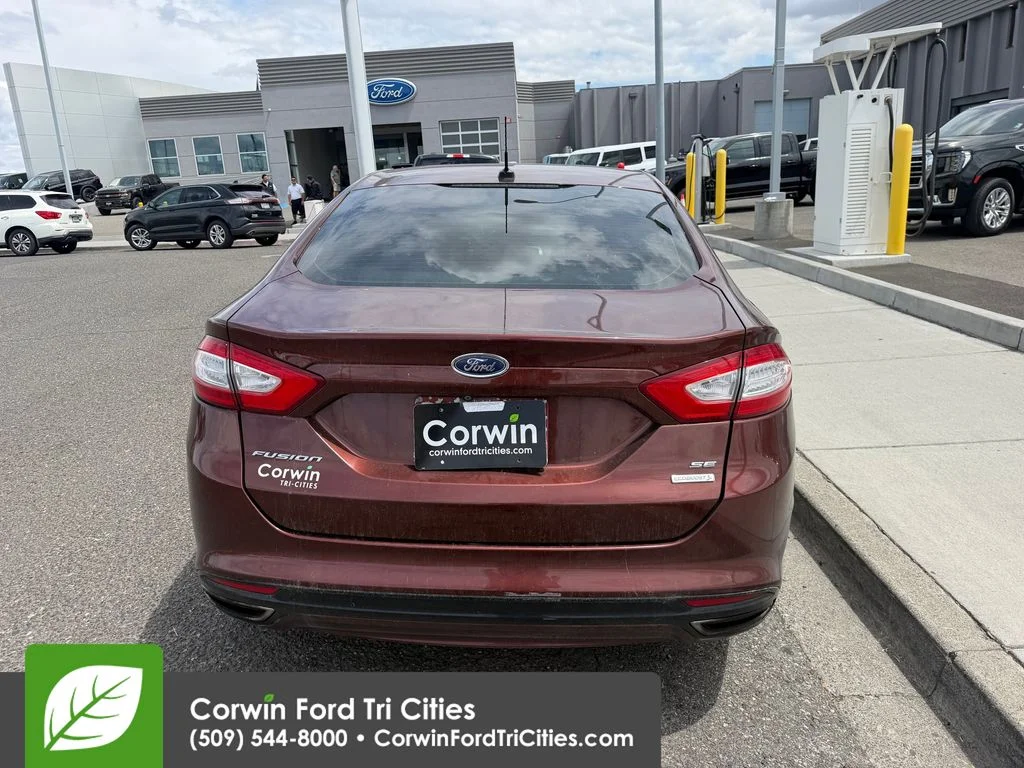 Used 2015 Bronze Fire Metallic Tinted Clearcoat Ford SE image 13