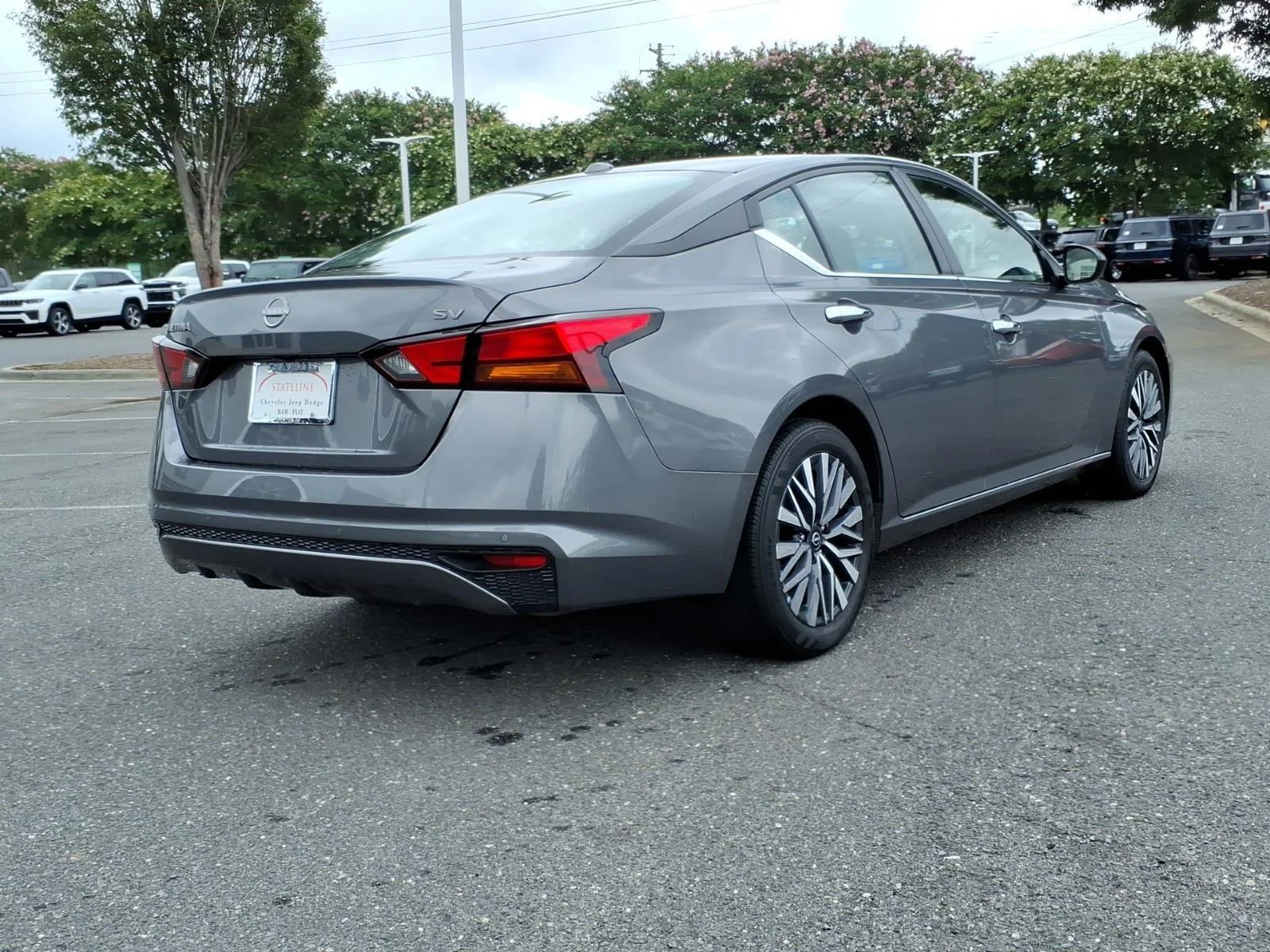 Used 2024 Gun Metallic Nissan 2.5 SV image 2