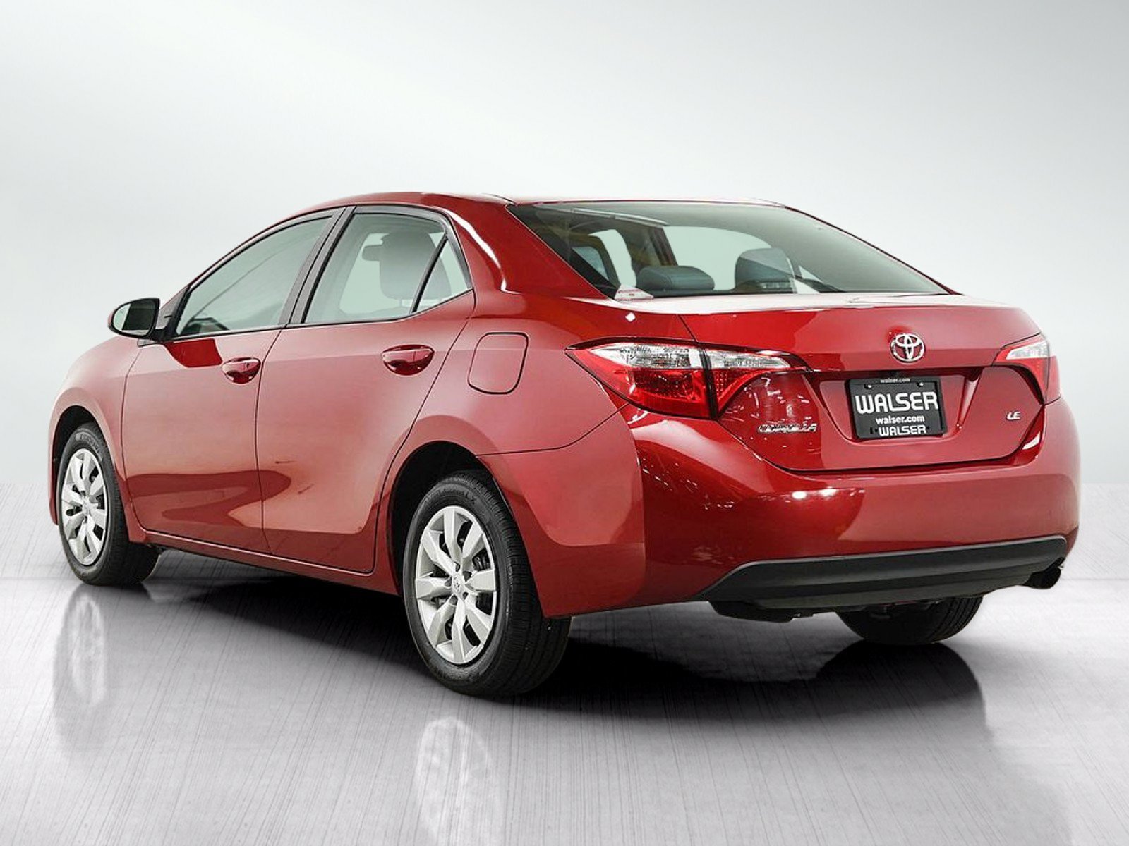Used 2016 Barcelona Red Metallic Toyota LE image 3