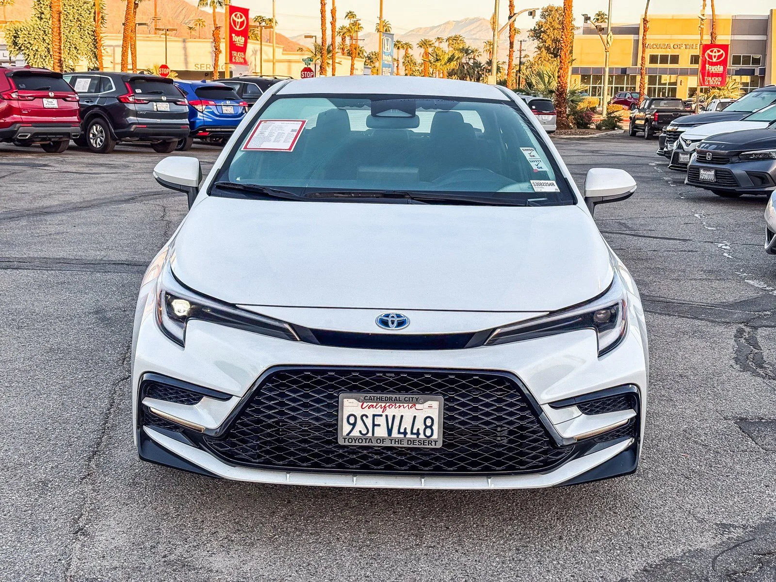 Certified Used 2025 Wind Chill Pearl Toyota Hybrid LE image 2
