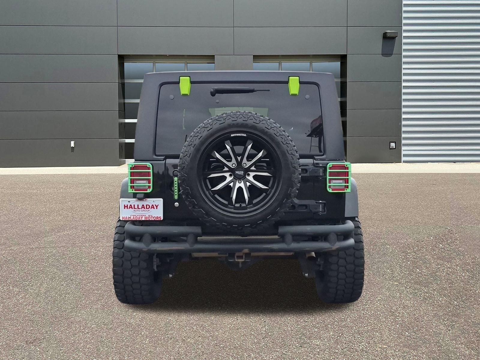Used 2015 Black Clearcoat Jeep Sahara image 7