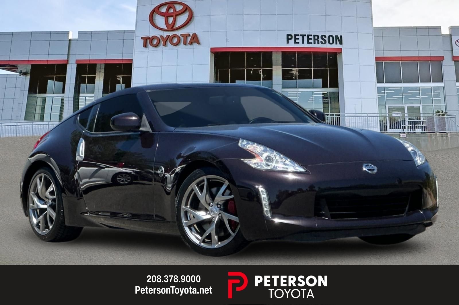 Used 2014 Red Nissan Touring image 1