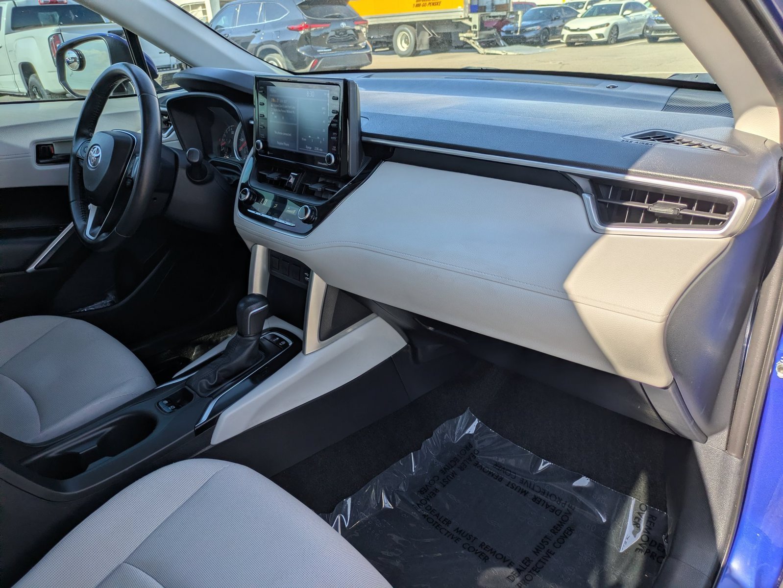 Used 2022 Blue Crush Metallic Toyota LE image 21