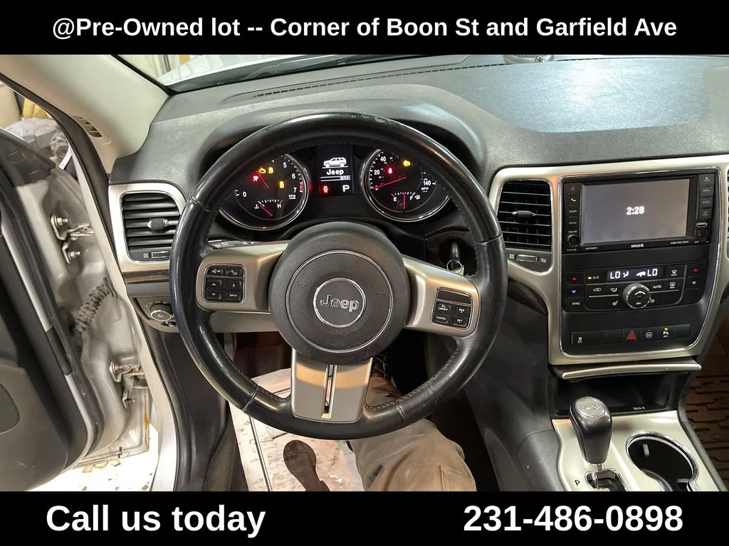 Used 2012 Silver Jeep Laredo image 17