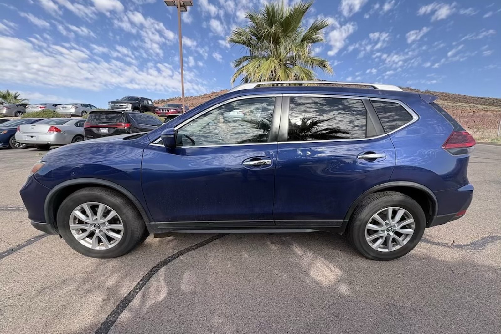Used 2019 Caspian Blue Metallic Nissan SV image 2