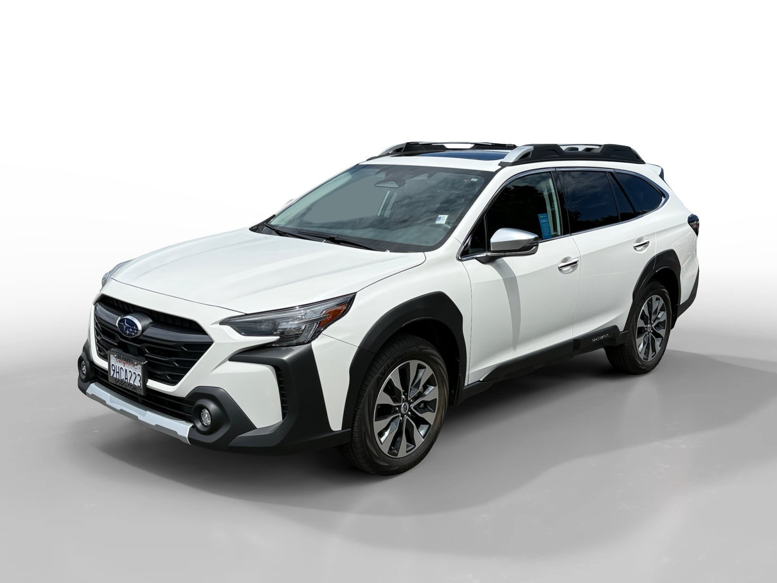 Used 2024 Crystal White Pearl Subaru Touring image 1
