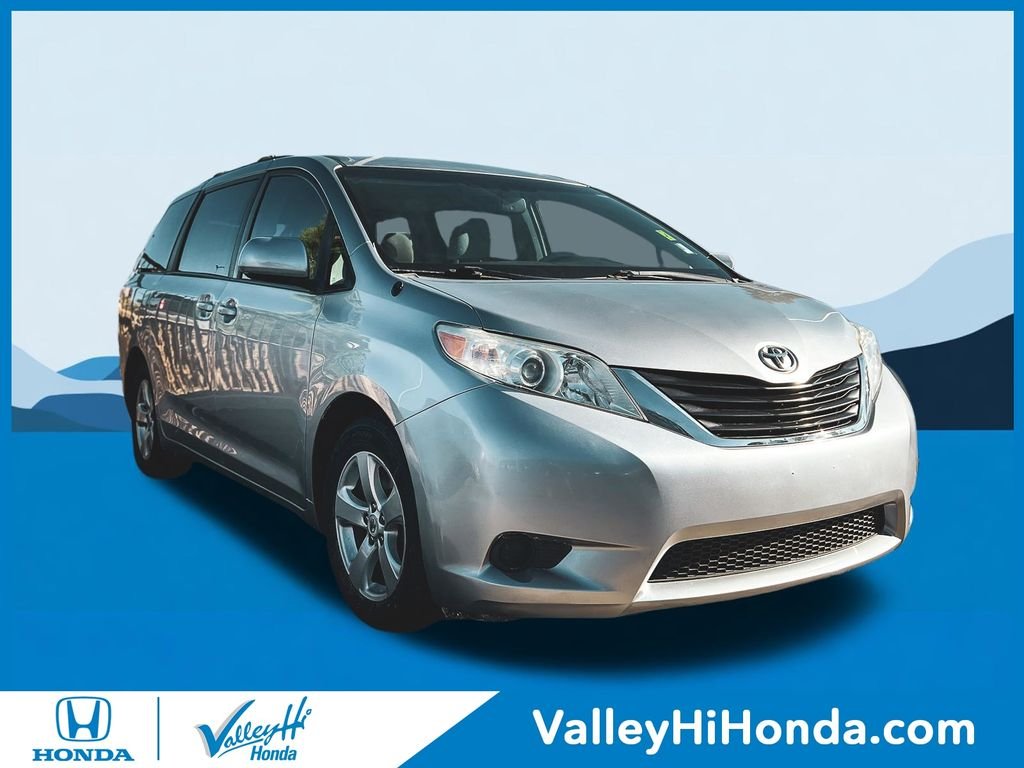 Used 2012 Silver Toyota LE image 1