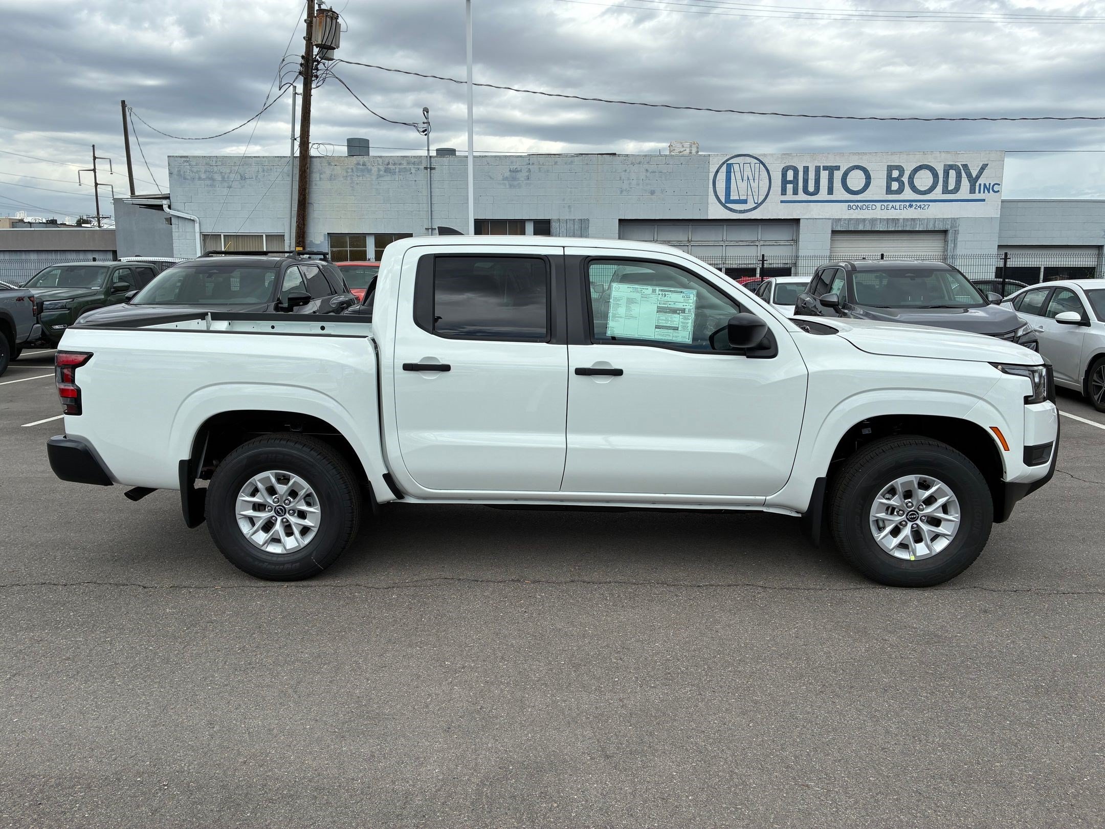 New 2026 Glacier White Nissan Crew Cab S image 2