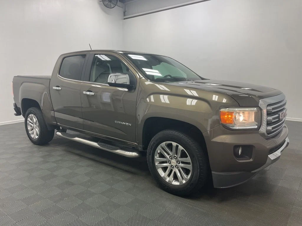 Used 2016 GMC Canyon SLT with VIN 1GTG5DE3XG1190114 for sale in Mount Dora, FL