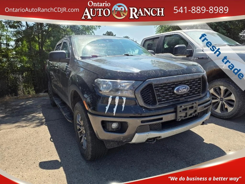 Used 2021 Shadow Black Ford XLT image 1