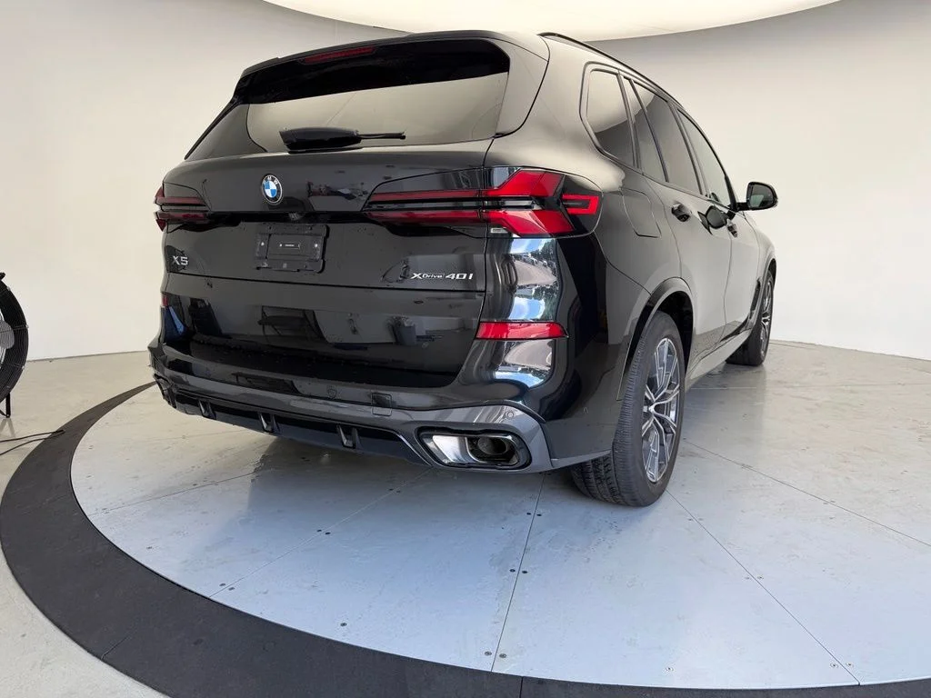 Certified Used 2024 Black BMW xDrive40i image 2