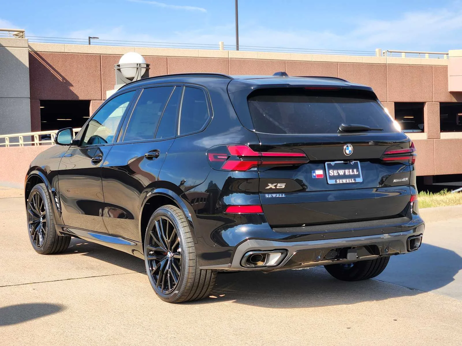 New 2026 Black Sapphire Metallic BMW xDrive40i image 3
