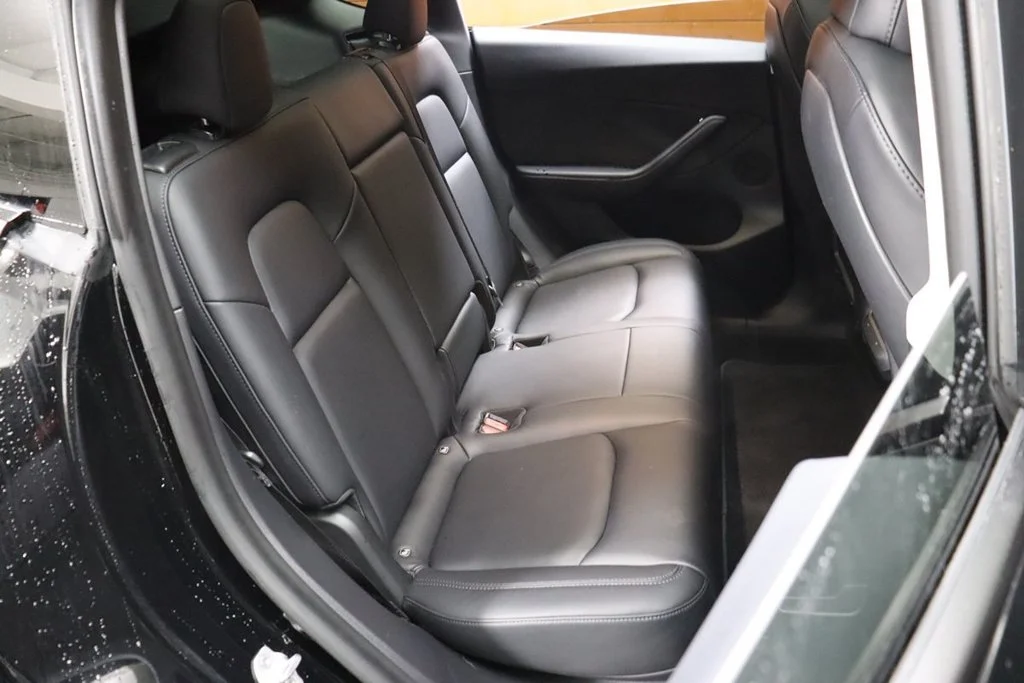 Used 2022 Solid Black Tesla Performance image 58