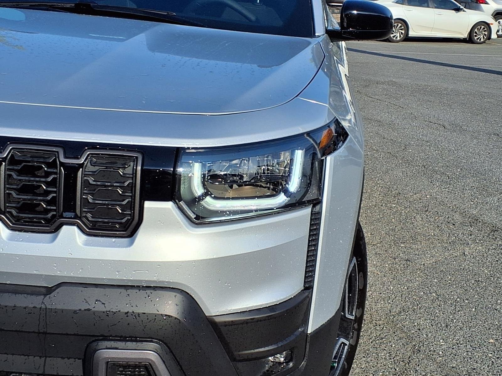 New 2026 Silver Zynith Clearcoat Jeep Laredo image 15