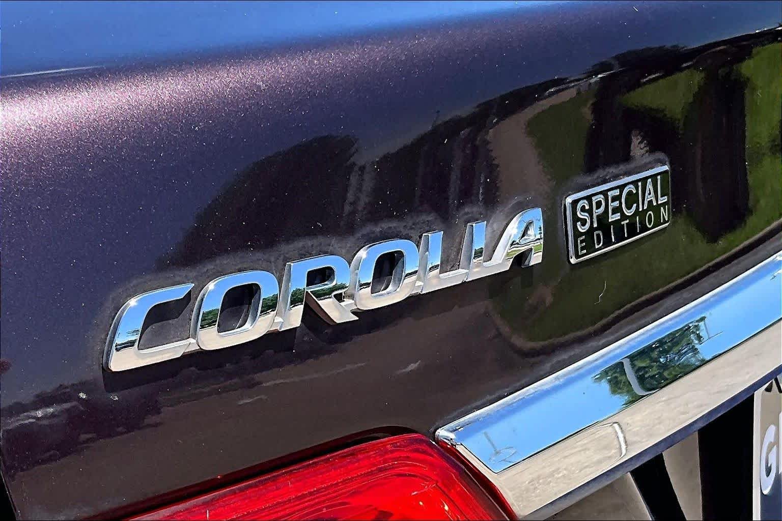 Used 2013 Black Currant Metallic Toyota LE Special Edition image 28
