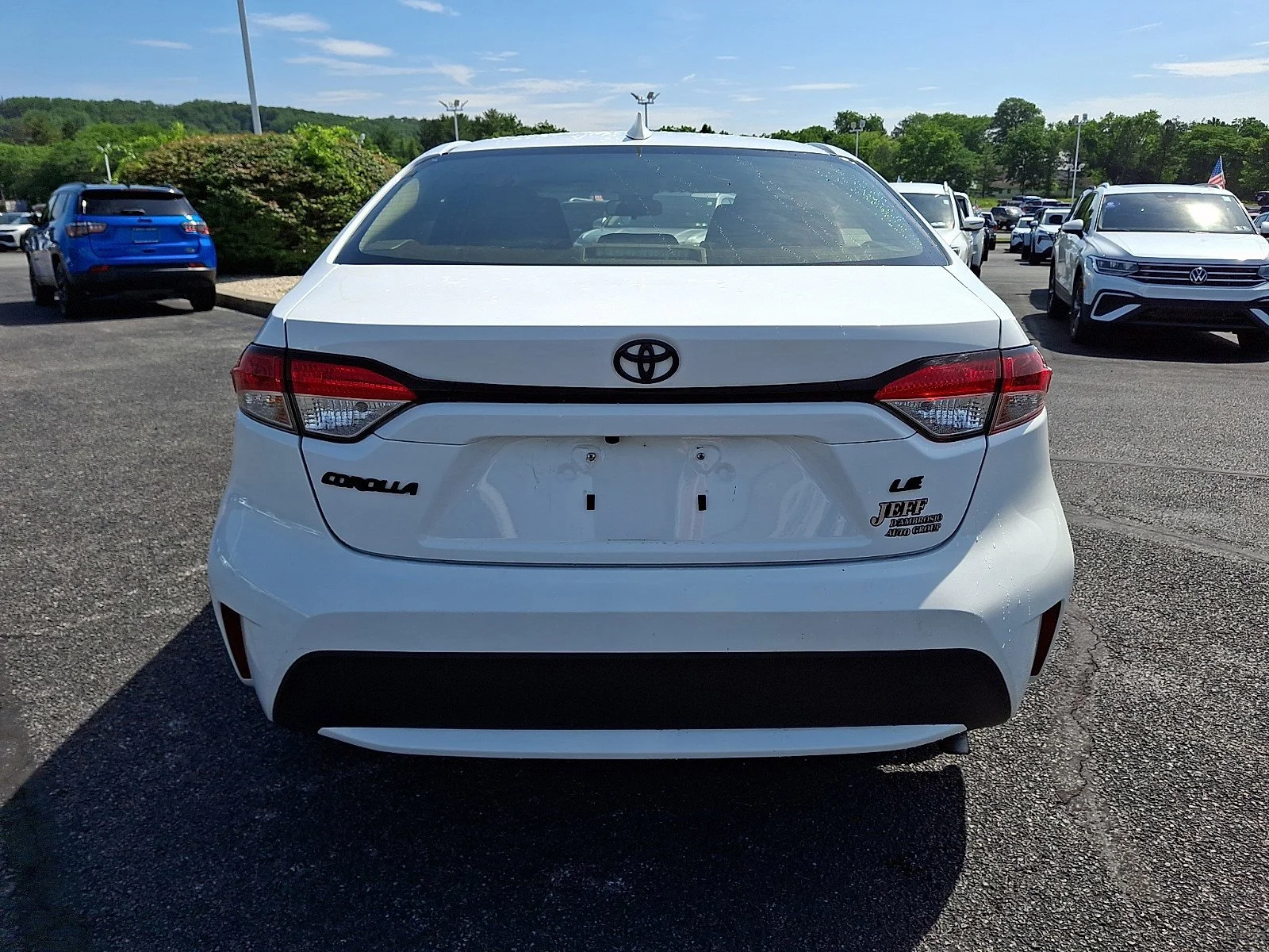 Used 2020 Super White Toyota LE image 6
