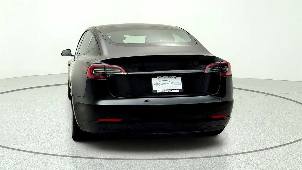 Used 2023 Solid Black Tesla RWD image 6