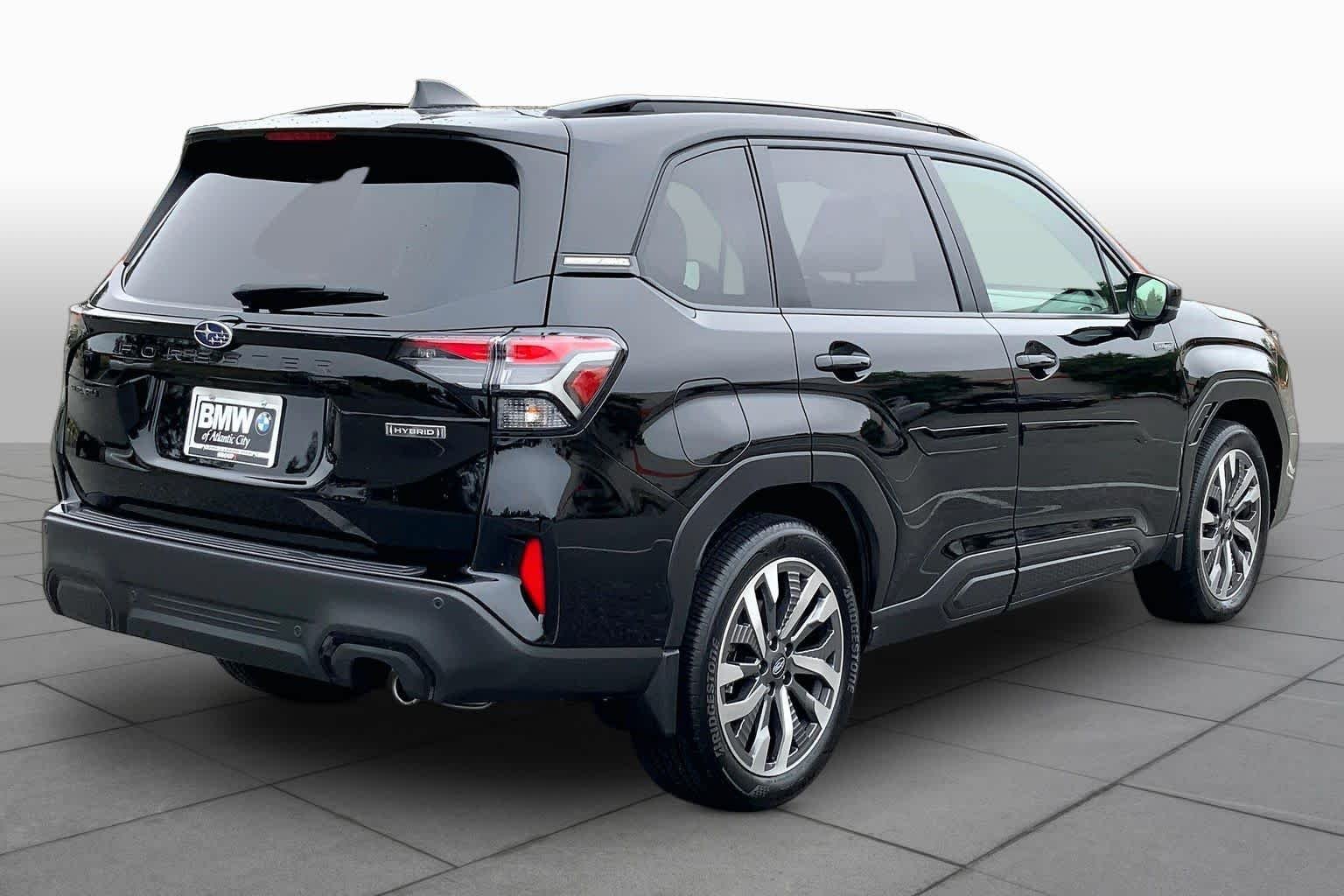Used 2025 Crystal Black Silica Subaru Touring Hybrid image 12