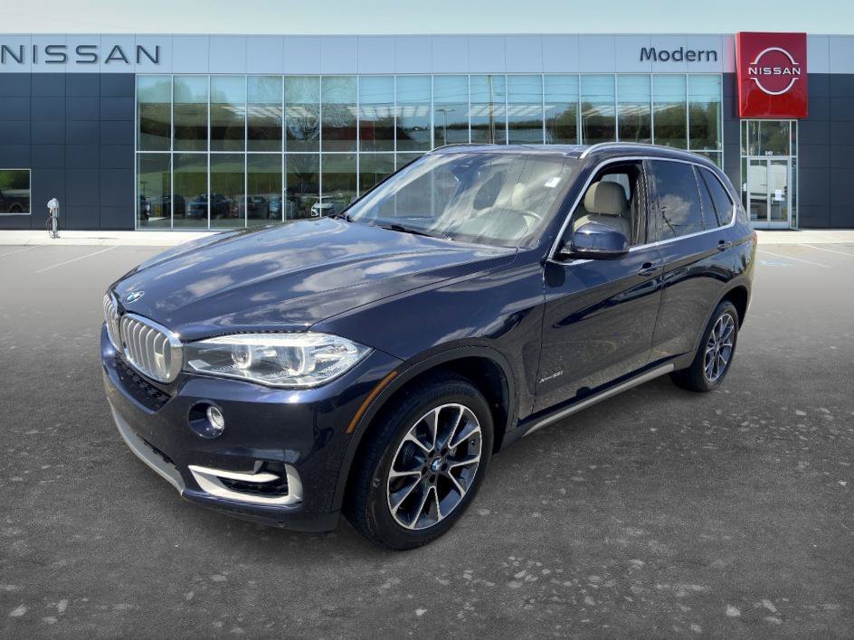 Used 2018 Imperial Blue Metallic BMW xDrive35i image 1
