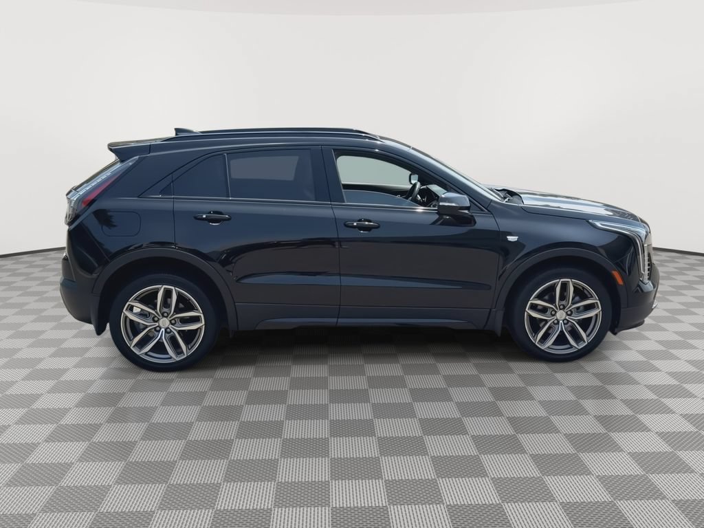 Used 2022 Stellar Black Metallic Cadillac Sport image 2