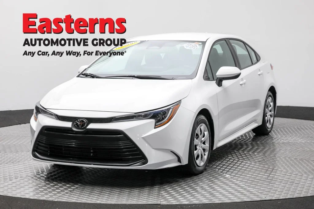 Used 2024 White Toyota LE image 1