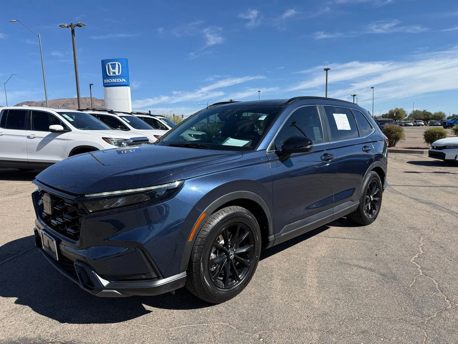 Certified Used 2025 Blue Honda Sport-L image 1